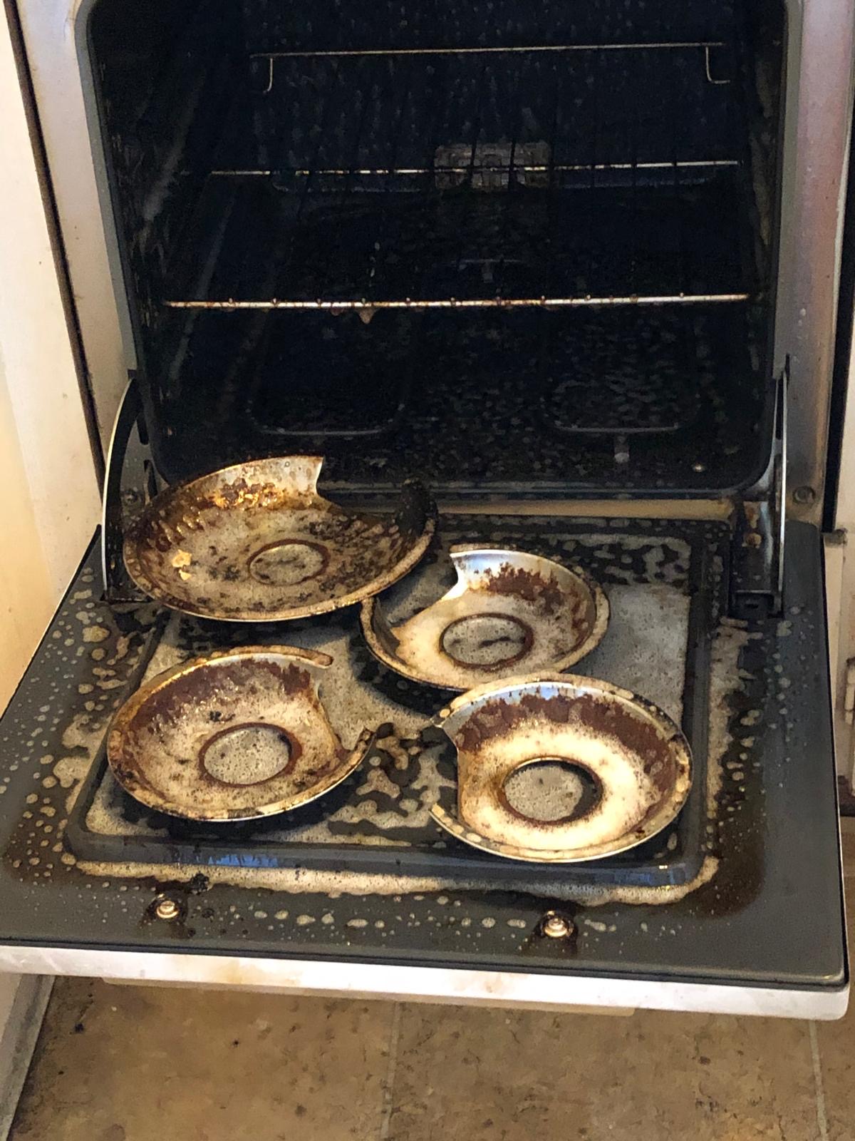 Dirty oven before deep cleaning service